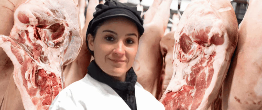 jims-farm-meat-female-employee-pork-production-cooler-cropped
